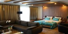 Romantic, rustic hotel room in Hotel Castellum in Holloko